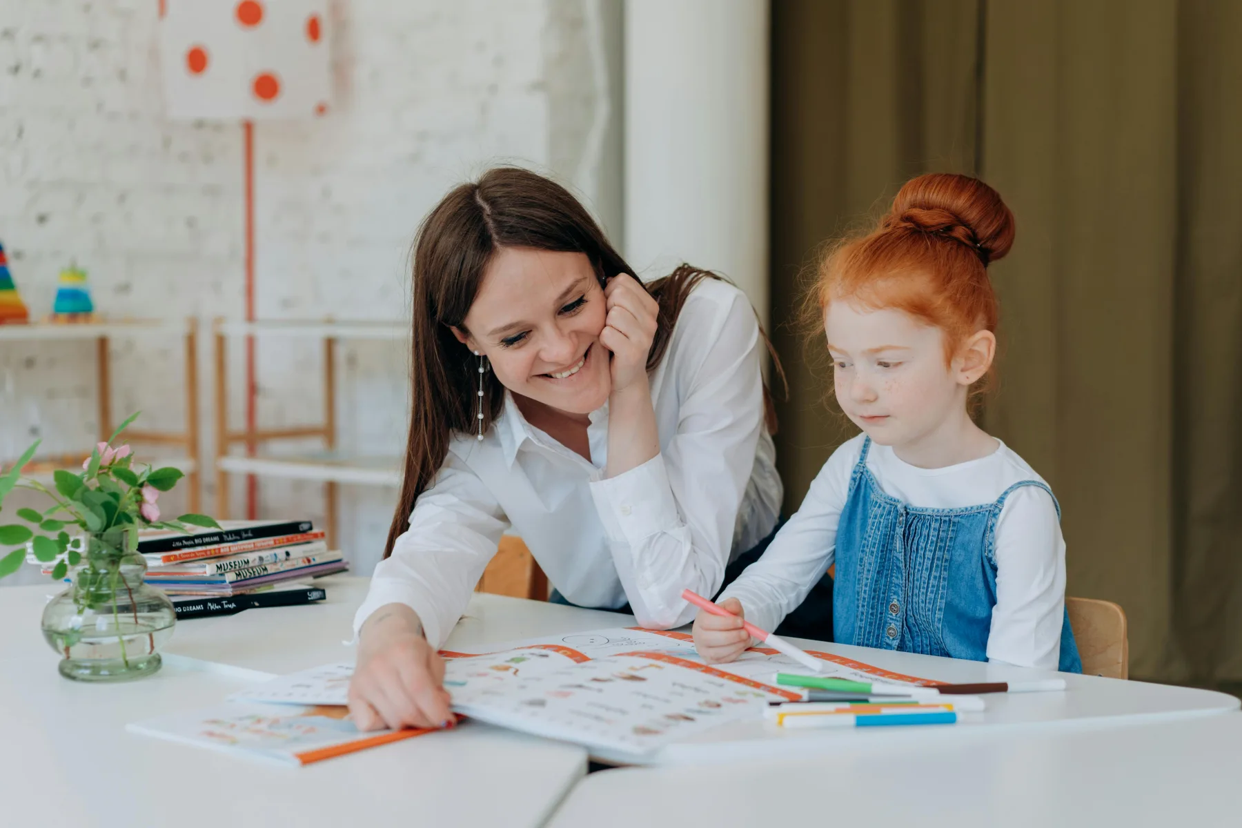 A student learning alongside a mentor